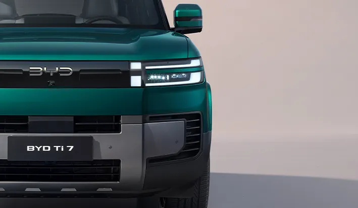 Close-up of BYD Ti7 LED headlights with dynamic welcome animation