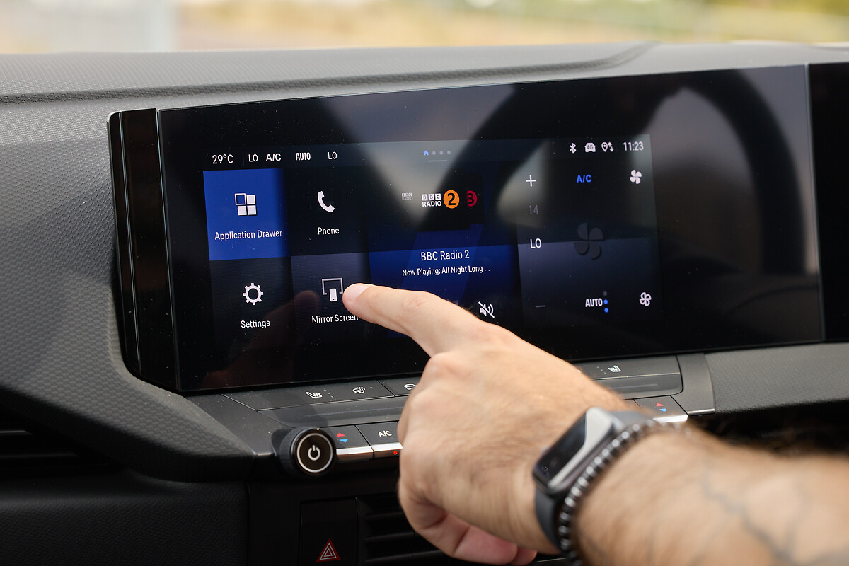 Vauxhall Astra touchscreen displaying radio and application menu interface