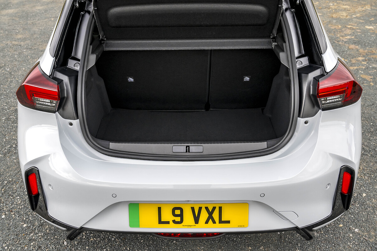 White Vauxhall Corsa open boot showing cargo space