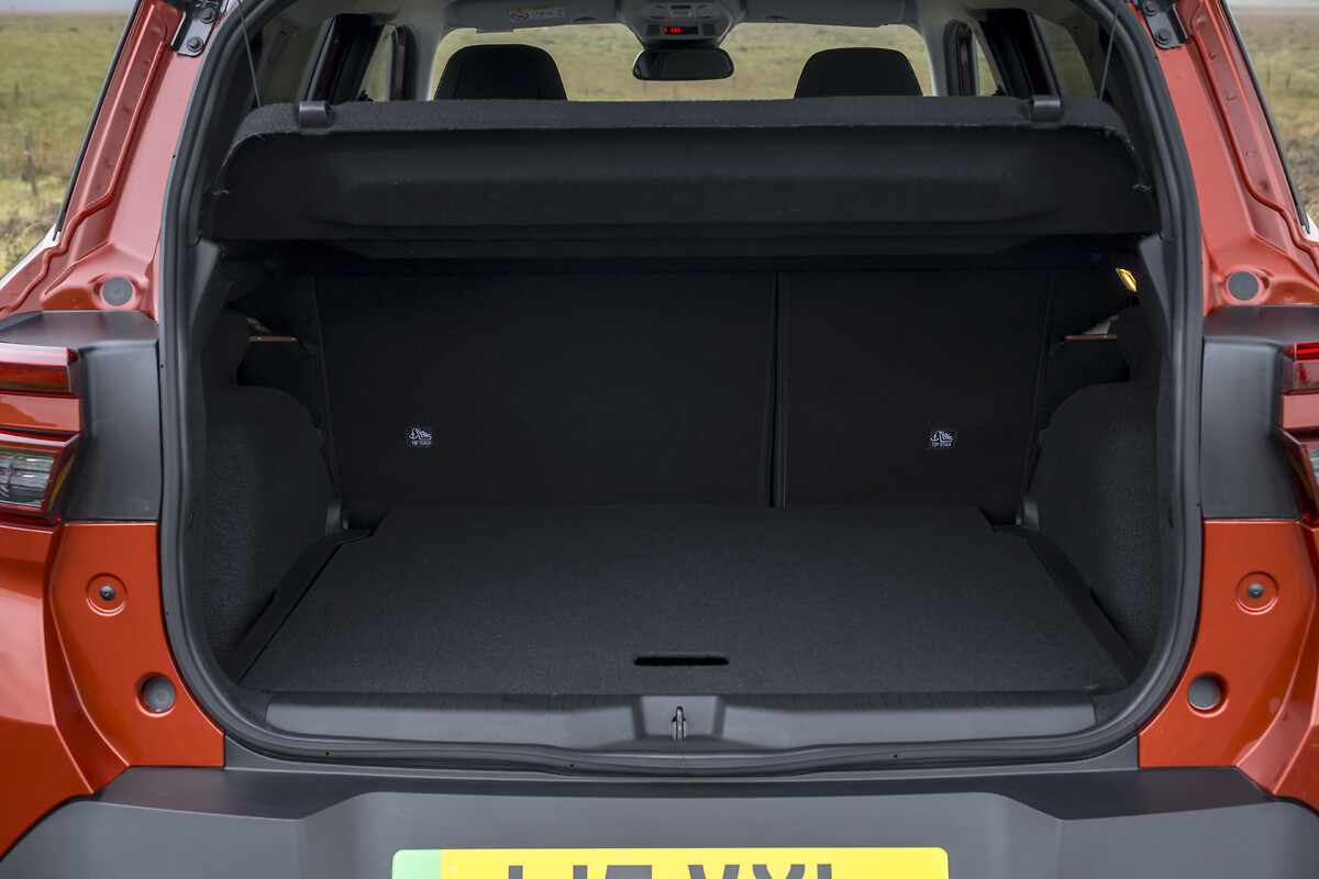 Open boot of red Frontera showing empty cargo space