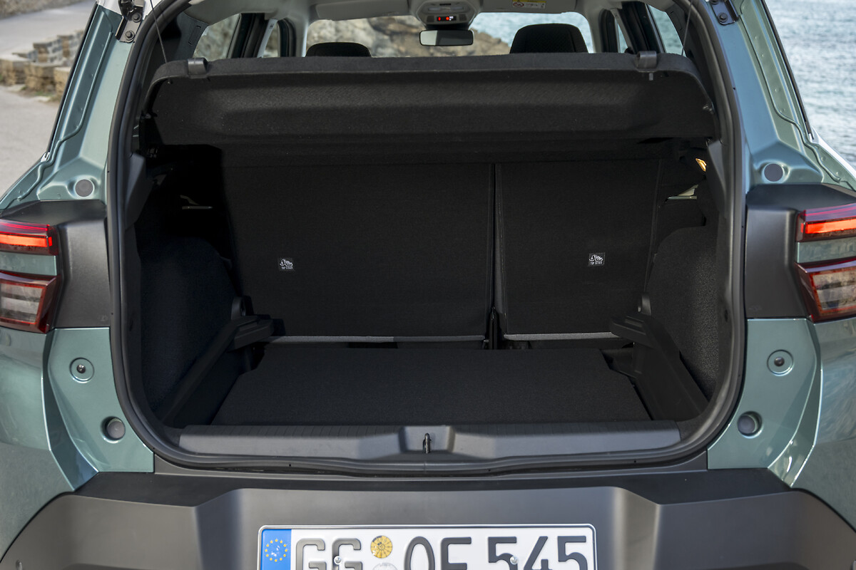 Open boot showing empty cargo space with seats folded