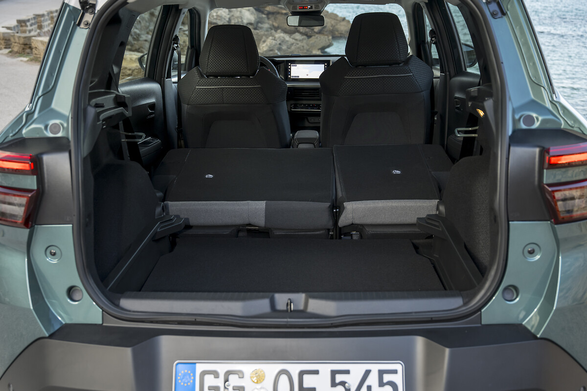 Open boot showing cargo area with rear seats visible